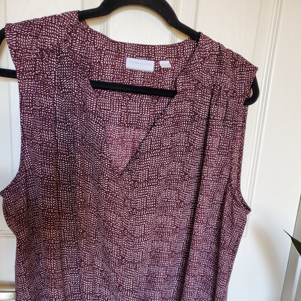 Sleeveless wrap style blouse